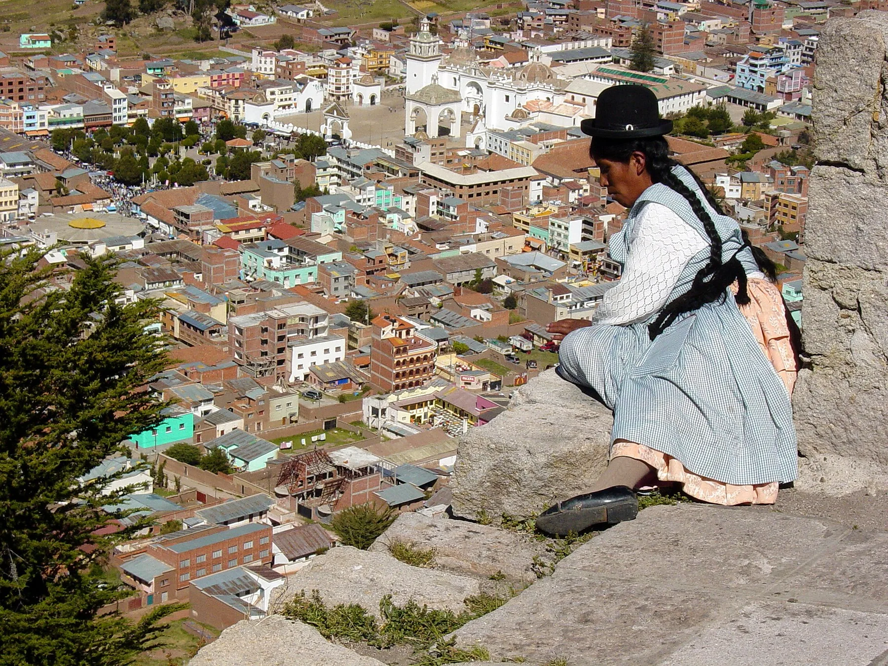 Aymara Woman Looks Out on Copacabana from Cerro Calvario - Copacabana - Bolivia