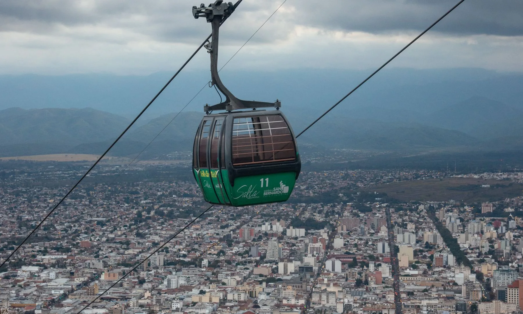 Scenic view of Salta city from a cable car on a cloudy day.